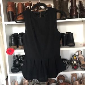 Black sleeveless peplum top